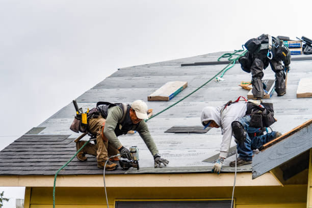 Professional Gutter Installation technician working in Bomont, WV